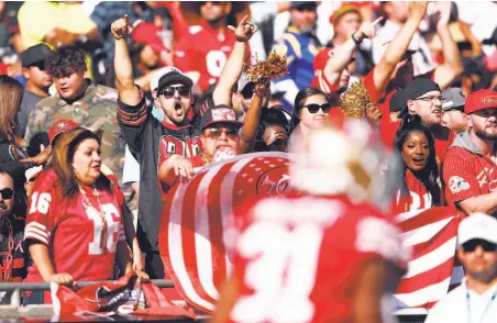  ?? Scott Strazzante / The Chronicle ?? 49ers fans swarmed Los Angeles Coliseum, where they were rewarded with San Francisco’s dominant 207 win on Sunday.