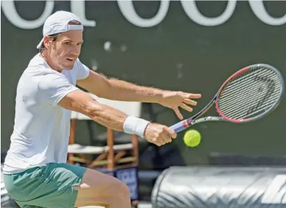  ?? AP ?? Germany’s Tommy Haas returns the ball to Pierre-Hugues Herbert of France during their first round match of the Mercedes Cup tennis tournament in Stuttgart, Germany, late on Tuesday. —