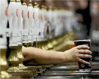  ?? PHOTO: REUTERS ?? The amount of alcohol in general hitting New Zealand stores is on the rise, an indication of demand.