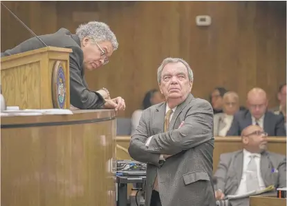  ?? RICH HEIN/SUN-TIMES ?? Cook County Board President Toni Preckwinkl­e confers with Commission­er John Daley at a meeting in 2017.