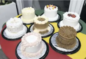  ?? ?? S Foods Bakery mini cakes: Mocha (centre), and (clockwise from left) coconut rum, vanilla, icebox, strawberry cheesecake, chocolate, and strawberry*