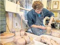  ??  ?? Tim Grieve at work in Crail Pottery