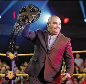  ?? CONTRIBUTE­D ?? Jeremy Ganger with the honorary championsh­ip belt he received at a televised WWE NXT promotion in Florida in November.