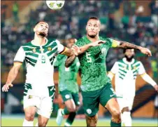  ?? ?? Super Eagles captain, William Troost- Ekong ( right), battling with Cameroon’s Frank Magri during their second round clash at the ongoing Africa Cup of Nations in Cote d’ivoire… on Saturday.