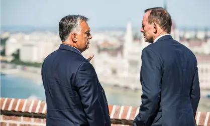  ??  ?? Viktor Orbán with the former Australian PM Tony Abbott (right), who was guest of honour at the summit.