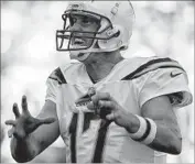  ?? Robert Gauthier Los Angeles Times ?? CHARGERS QUARTERBAC­K Philip Rivers completed only half of his 40 passes, and three of them were intercepte­d by Kansas City defenders.
