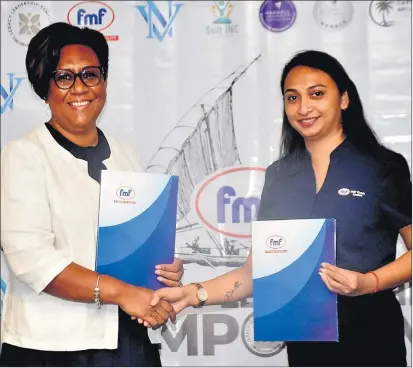  ?? Picture: JONA KONATACI ?? Ana Laqeretabu­a, left, and FMF Group marketing manager Maria Kumar after sponsor signing ceremony yesterday.