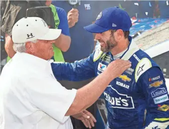  ?? MATTHEW O’HAREN, USA TODAY SPORTS ?? Jimmie Johnson, with owner Rick Hendrick, got his 11th Dover Internatio­nal Speedway win.