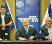  ?? (Marc Israel Sellem/The Jerusalem Post) ?? PRIME MINISTER Benjamin Netanyahu meets with Likud Party members yesterday.