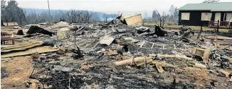  ?? Picture: WERNER HILLS ?? DEVASTED VILLAGE: Burnt-out houses in Farleigh, near Karatara, where several people lost their lives in the fire that ravaged the area in October