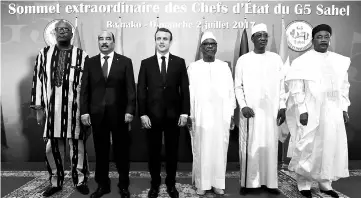  ??  ?? (From left) President of Burkina Faso Roch Marc Christian Kabore, Mauritania­n President Mohamed Ould Abdel Aziz, French President Emmanuel Macron, Mali’s President Ibrahim Boubacar Keita, Chad’s president Idriss Deby Itno and Niger’s President...