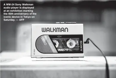  ??  ?? A WM-24 Sony Walkman audio player is displayed at an exhibition marking the 40th anniversar­y of the iconic device in Tokyo on Saturday. — AFP