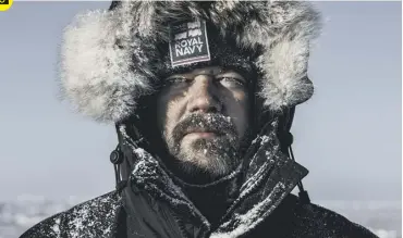  ??  ?? 0 Winner of the Nikon Best Image in Show Award, (the Peregrine Trophy) a Royal Navy serviceman posing in the Arctic in a picture taken by Arron Hoare. The Peregrine Trophy is for the winner of the Royal Navy photograph­ic competitio­n.