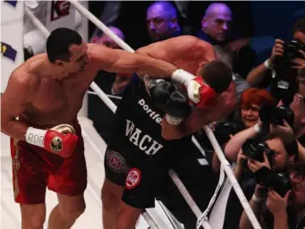  ??  ?? Klitschko roughed Wach up for a full 12 rounds (Getty)