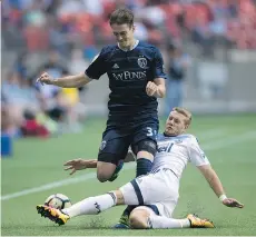  ?? THE CANADIAN PRESS FILES ?? Brett Levis, seen here tackling Sporting Kansas City's Cameron Porter, led Whitecaps FC 2 to the USL playoffs.