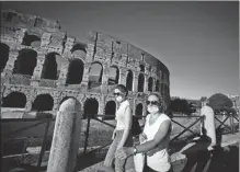  ?? PROVIDED TO CHINA DAILY ?? Visitors to the Colosseum in Rome wear masks on Oct 8. Italy has tightened measures to contain a resurgent coronaviru­s outbreak.