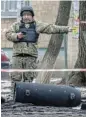  ?? /Reuters ?? Used to it: A bomb squad member works next to a part of a missile after a Russian missile attack in Kyiv,