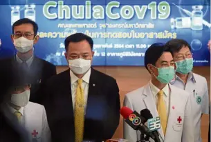  ??  ?? Latest news: Anutin (second from left) holding a news conference to give an update on the progress of the ‘ChulaCov19’ vaccine in Bangkok.