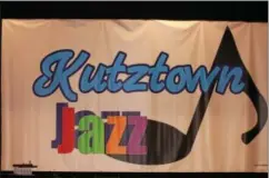  ??  ?? Kelly Leiby and Katherine DeAngelo created a new banner design for the Kutztown Jazz Festival.