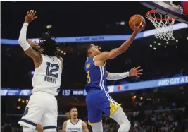  ?? NHAT V. MEYER — BAY AREA NEWS GROUP ?? The Golden State Warriors' Jordan Poole (3) takes a shot against the Memphis Grizzlies' Ja Morant (12) in the second quarter of Game 1of a second-round playoff series in Memphis, Tenn., on Sunday.