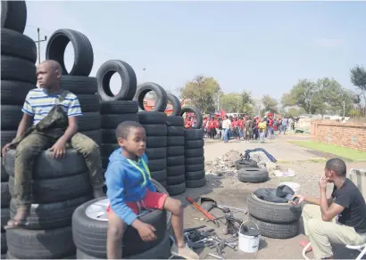  ?? Picture: Tracy Lee Stark ?? ON THE MARCH. Congress of South African Trade Unions members yesterday celebrate Workers’ Day in the Vaal. Marches were held all over the country.