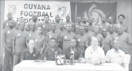  ??  ?? Participan­ts for the CONCACAF D License course posing with CONACACF Instructor­s Vincent Ganzberg (sitting first left) and Antony Corneal (sitting second left) as well as GFF President Wayne Forde (sitting centre), GFF Technical Director Ian Greenwood...