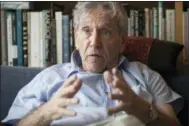  ?? DAN BALILTY — THE ASSOCIATED PRESS FILE ?? Israeli writer Amos Oz poses for a photo at his house in Tel Aviv, Israel. Israeli media said Friday that renowned Israeli author Amos Oz has died at the age of 79. Oz, author of novels, prose and a widely acclaimed memoir, had suffered from cancer. Oz won numerous prizes, including the Israel Prize and Germany’s Goethe Award, and was a perennial contender for the Nobel Prize in literature.