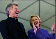  ?? AP/JULIO CORTEZ ?? Hillary Clinton shares the stage with musician Jon Bon Jovi during a campaign stop Wednesday at the Newark, N.J., campus of Rutgers University.