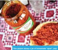  ??  ?? This picture shows a jar of homemade “ajvar”, popular relish made of red peppers.