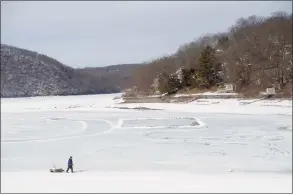  ?? H John Voorhees III / Hearst Connecticu­t Media ?? First Light Power conducted a deep draw down of Candlewood Lake this season to try and kill off invasive species in the lake on Wednesday in Danbury.