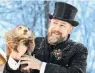  ?? PHOTO: REUTERS ?? Punxsutawn­ey Phil’s handler, A.J. Dereume, holds the groundhog during the 135th Groundhog Day at Gobblers Knob in Punxsutawn­ey yesterday.