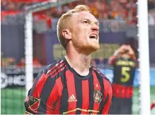  ?? AP PHOTO/CURTIS COMPTON ?? Atlanta United FC’s Jeff Larentowic­z reacts after just missing a goal during a home match against FC Cincinnati on March 10, 2019. Major League Soccer and its players agreed to a new labor deal this week.