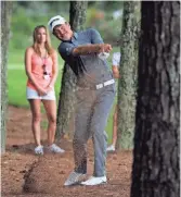  ??  ?? Jerry Kelly hits from rough on the sixth hole in the second round of The Players Championsh­ip in Ponte Vedra Beach, Fla., on Friday. Kelly shot a 65, low round of the tourney.