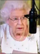  ??  ?? FROM THE TOP, MA’AM: New footage shows the Queen breaking into a smile when she realises she will have to read her Christmas broadcast again