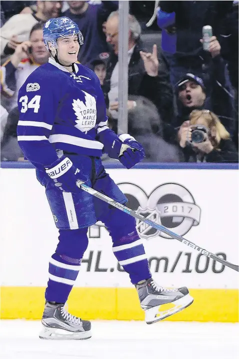  ?? — THE CANADIAN PRESS ?? Maple Leafs centre Auston Matthews celebrates after scoring his 35th goal of the season to give Toronto a 1-0 lead over Florida on Tuesday night. The goal broke Wendel Clark’s rookie record of 34.