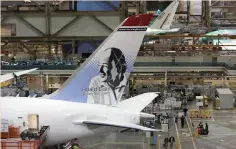  ?? (Jason Redmond/Reuters) ?? BRITISH STORYTELLE­R Roald Dahl is pictured on a Norwegian Air Boeing 787 being built at Boeing’s production facility in Everett, Washington, on June 1.