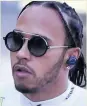  ??  ?? BATTLE Lewis Hamilton