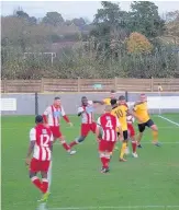  ??  ?? Action from Loughborou­gh Dynamo’s 4-1 win over Romulus. Picture by Norman Fall.