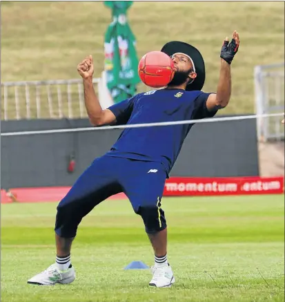  ?? Picture: GALLO IMAGES ?? BALL GAMES: Hashim Amla shows off his ball skills during a training session at Kingsmead in Durban yesterday