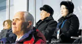  ?? AP ?? Kim Yo Jong and Kim Yong Nam sit behind Vice-President Mike Pence.