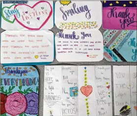  ?? MANTEJ LAMBA VIA ASSOCIATED PRESS ?? Handwritte­n thank-you cards for health care workers are displayed in Fremont, California, in this photo provided by Mantej Lamba. Siblings Mantej, 17, and Prabhleen Lamba, 15, started the Cards 4 Covid Heroes initiative in May and have since delivered more than 250 thank-you cards to hospitals in California and Arizona.