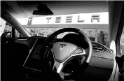  ?? REUTERS ?? A troublesom­e quarterly sales report, the emergence of competing electric vehicles and lingering concern about Tesla’s ability to mass produce have sent its stock down 13 per cent this week