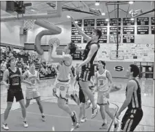  ?? Frank Crowe ?? Sonoravill­e junior Orry Darnell rises for the rim during the Phoenix’s game against the Coahulla Creek Colts at Sonoravill­e High School on Jan. 21.