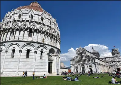  ?? (Rick Steves) ?? On the Field of Miracles, Pisa’s Baptistery is Italy’s biggest, with interior ambience, a hexagonal pulpit and impressive acoustics.