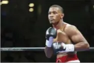  ?? GREGORY PAYAN — THE ASSOCIATED PRESS FILE ?? In this file photo, boxer Daniel Jacobs squares off against Sergio Mora during their WBA middleweig­ht title fight at the Barclays Center in New York. Jacobs likes to think of himself as New York’s resident boxer. He’ll be spreading his word on Saturday...