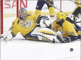  ?? AP PHOTO ?? Nashville Predators goalie Pekka Rinne and defenceman P.K. Subban stop a shot by the Pittsburgh Penguins during the second period in Game 3 of the Stanley Cup Finals.