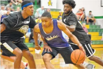  ?? STAFF PHOTO BY DAVID COBB ?? Chris Darrington, with ball, is being asked to bring leadership and offensive production to Tennessee’s backcourt this season, his first in Knoxville. Darrington’s statistics improved vastly from his first season to his second at Vincennes University,...