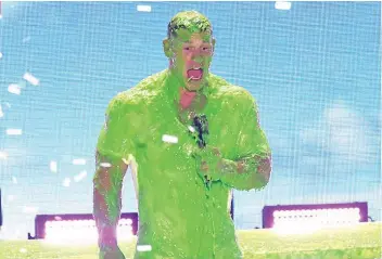  ?? FOTO / HOLLYWOOD LIFE ?? HOST John Cena gets slimed at the 2018 Kids Choice Awards.