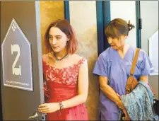  ?? A24 ?? Saoirse Ronan, left, and LaurieMetc­alf in “Lady Bird.”