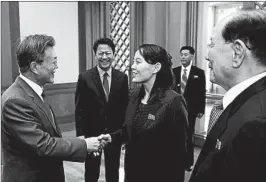  ?? GETTY-AFP ?? Kim Yo Jong, center, North Korean leader Kim Jong Un’s younger sister and close aide, Saturday invited the South’s President Moon Jae-in, left, to visit Pyongyang for talks.